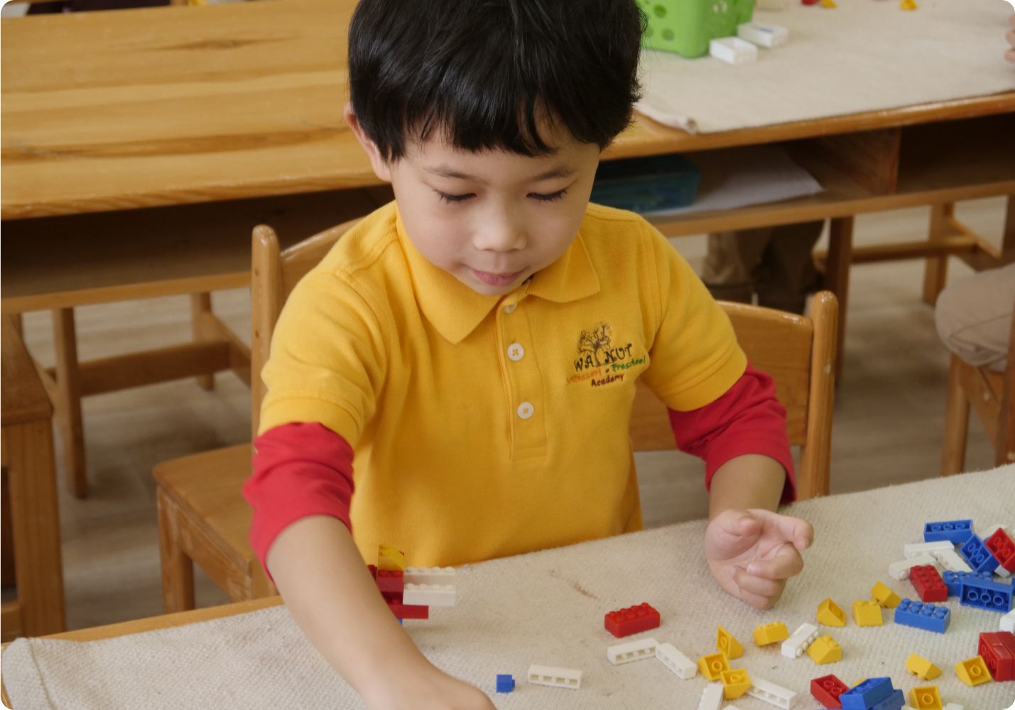 Child building with blocks